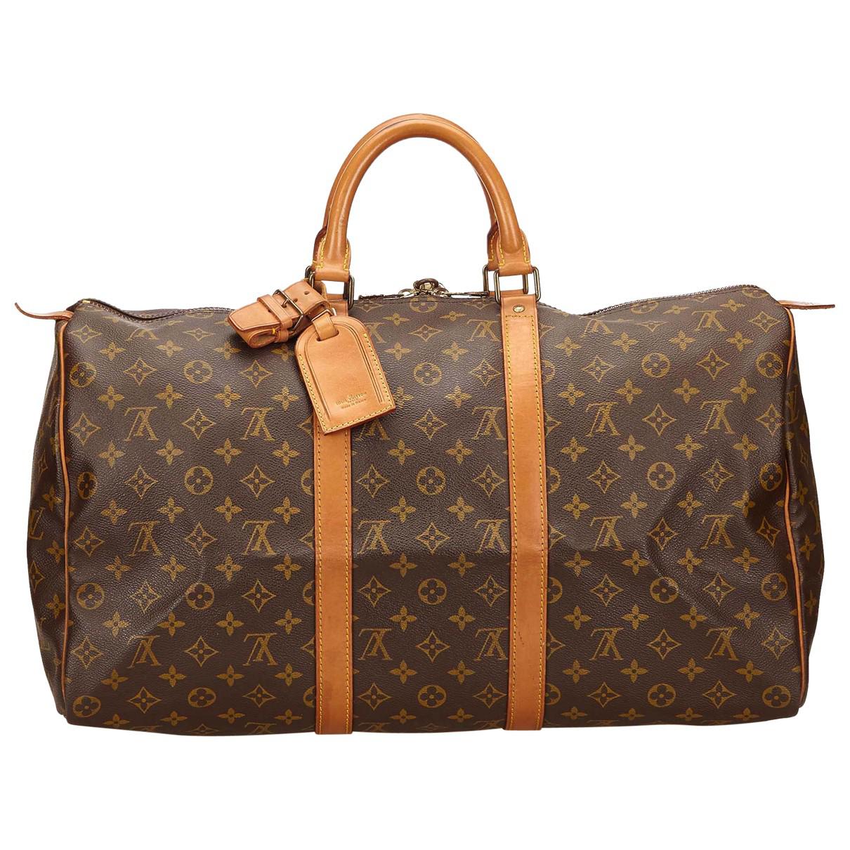Lyst - Louis Vuitton Pre-owned Keepall Cloth Travel Bag in Brown
