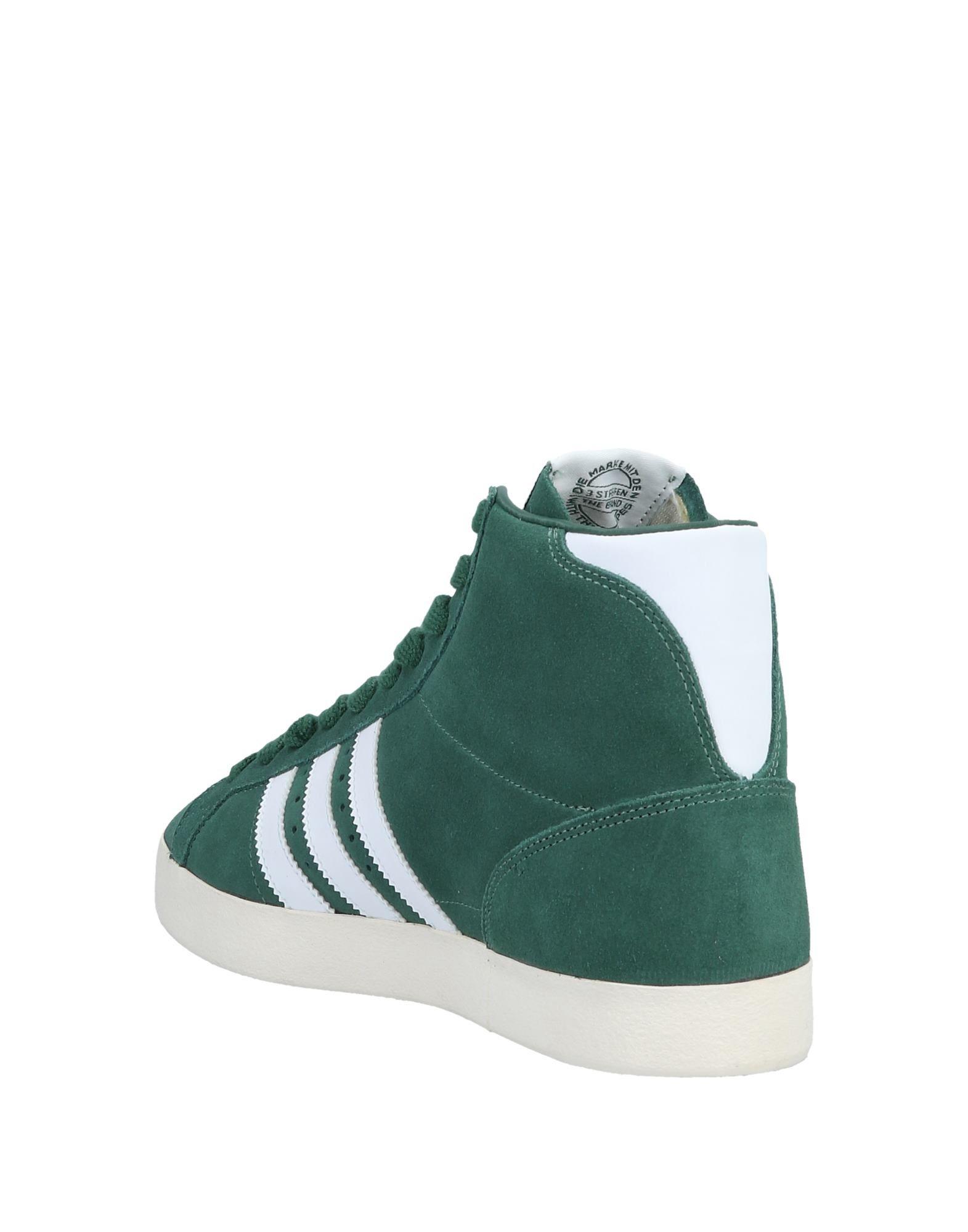 green adidas high top sneakers