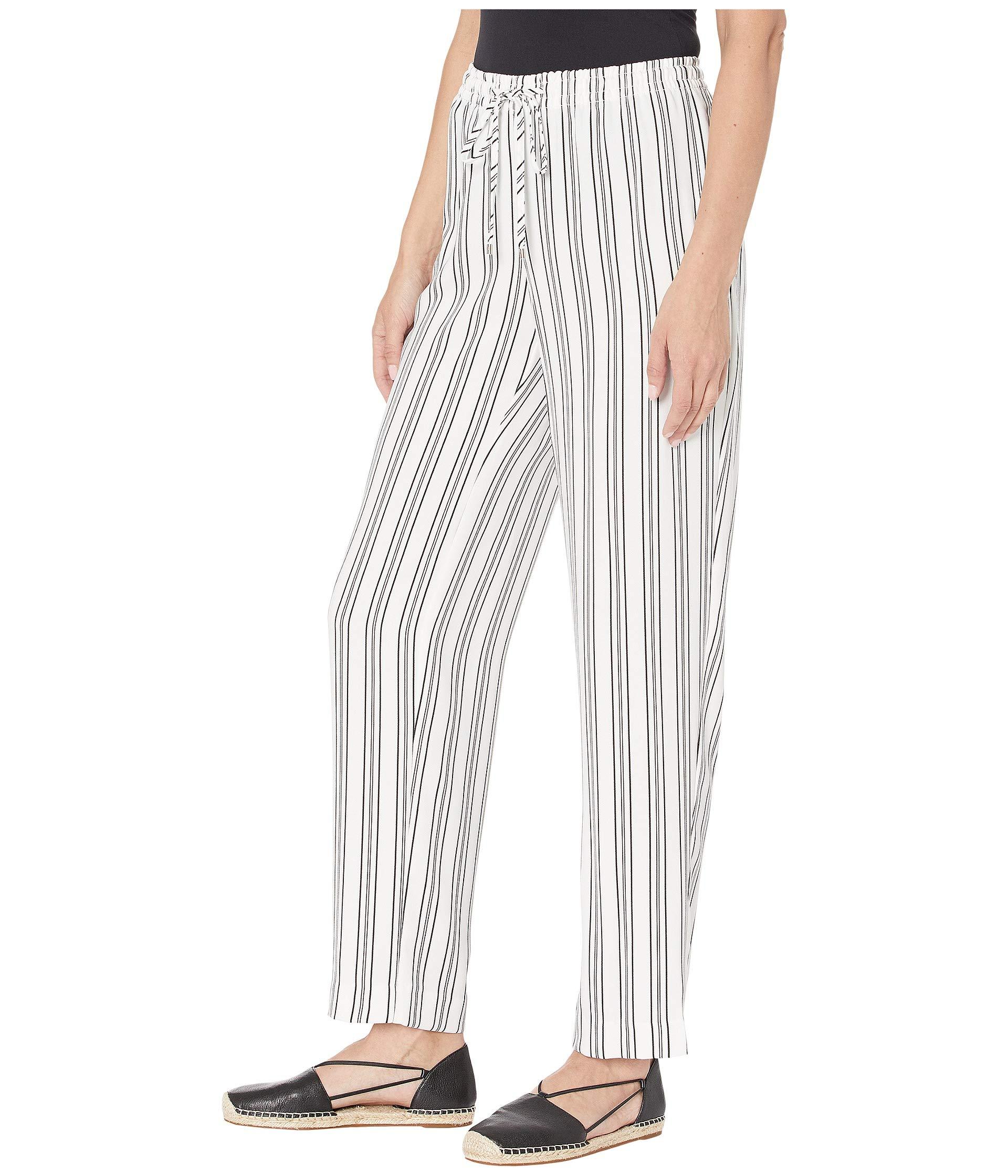 white polo and black pants womens