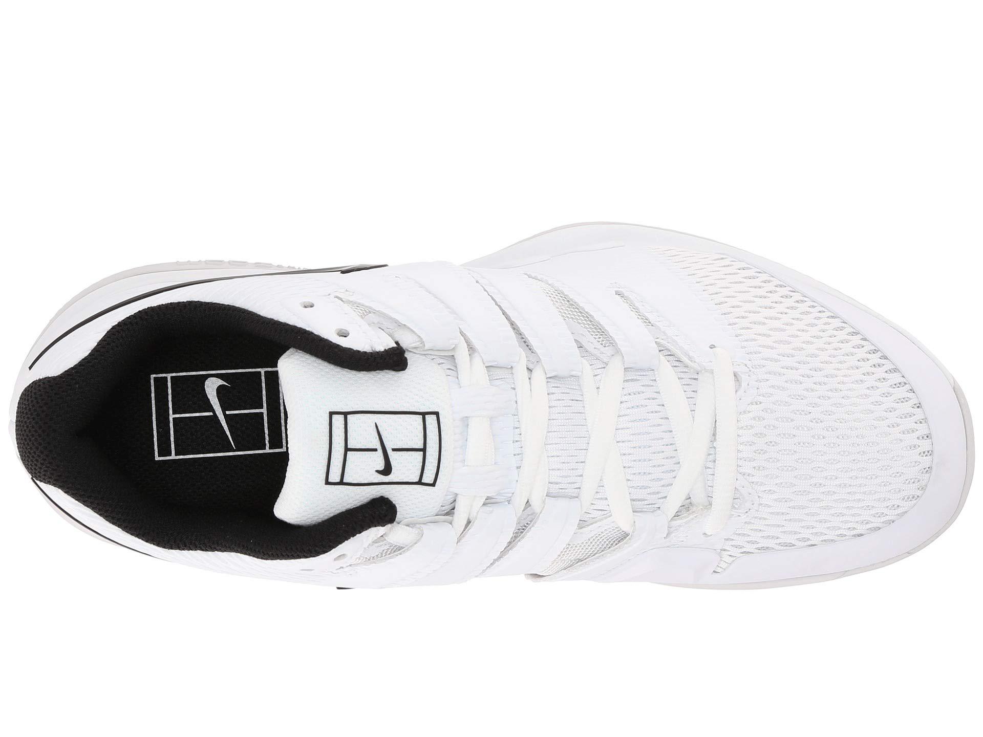 white and grey nike tennis shoes