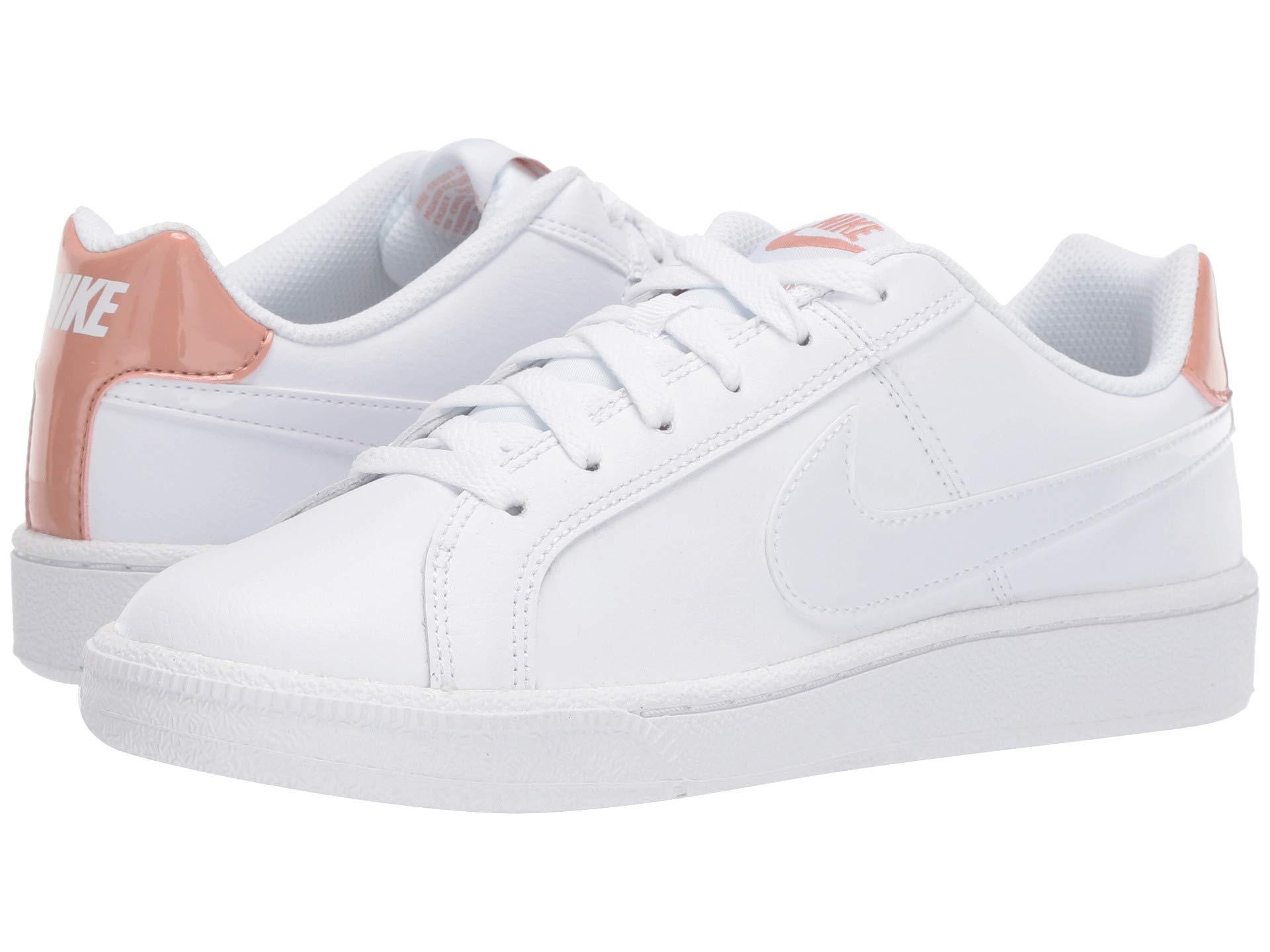 white and rose gold nike sneakers