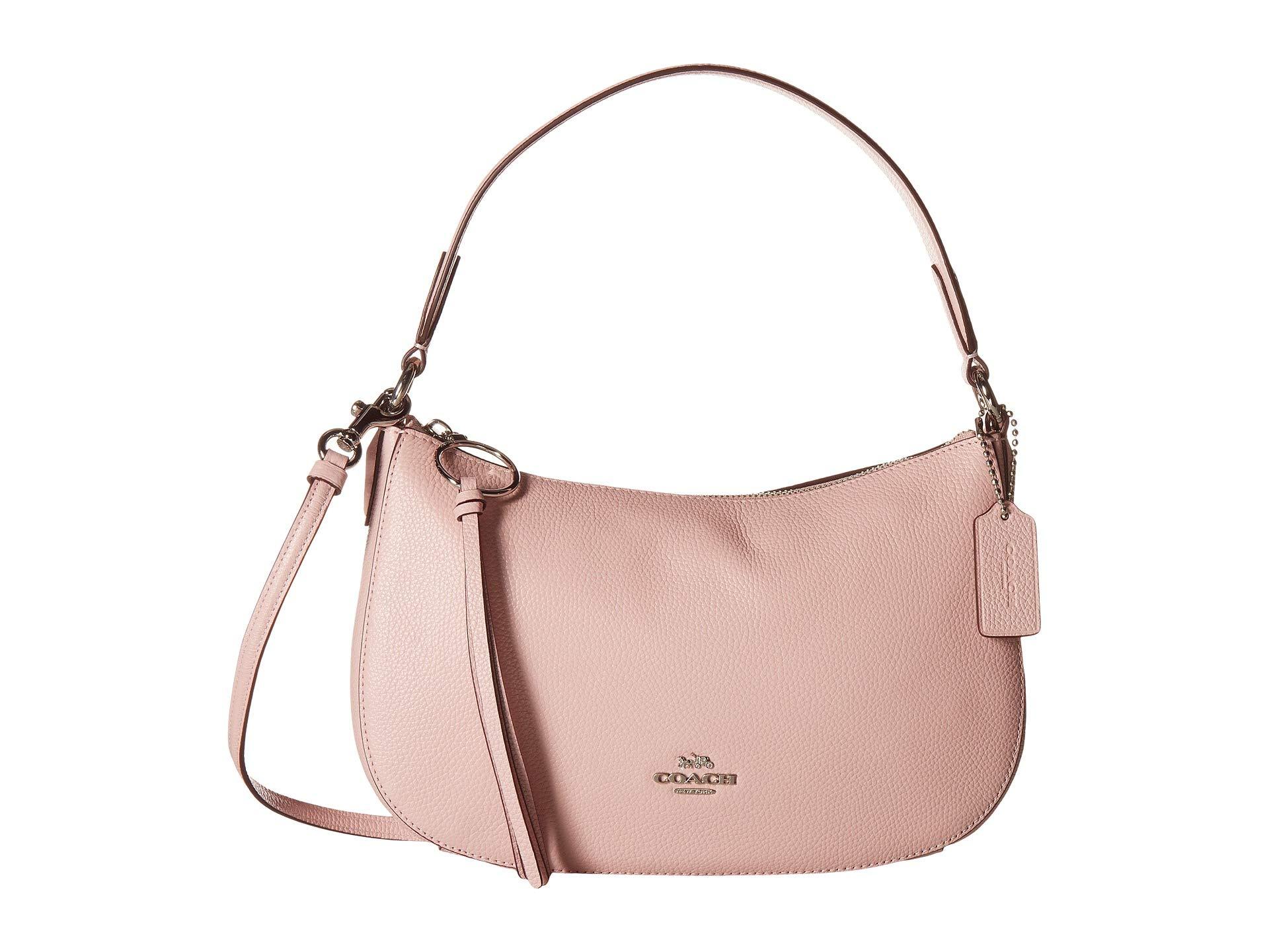 Lyst - COACH Polished Pebble Leather Sutton Crossbody (black/gold) Handbags in Pink